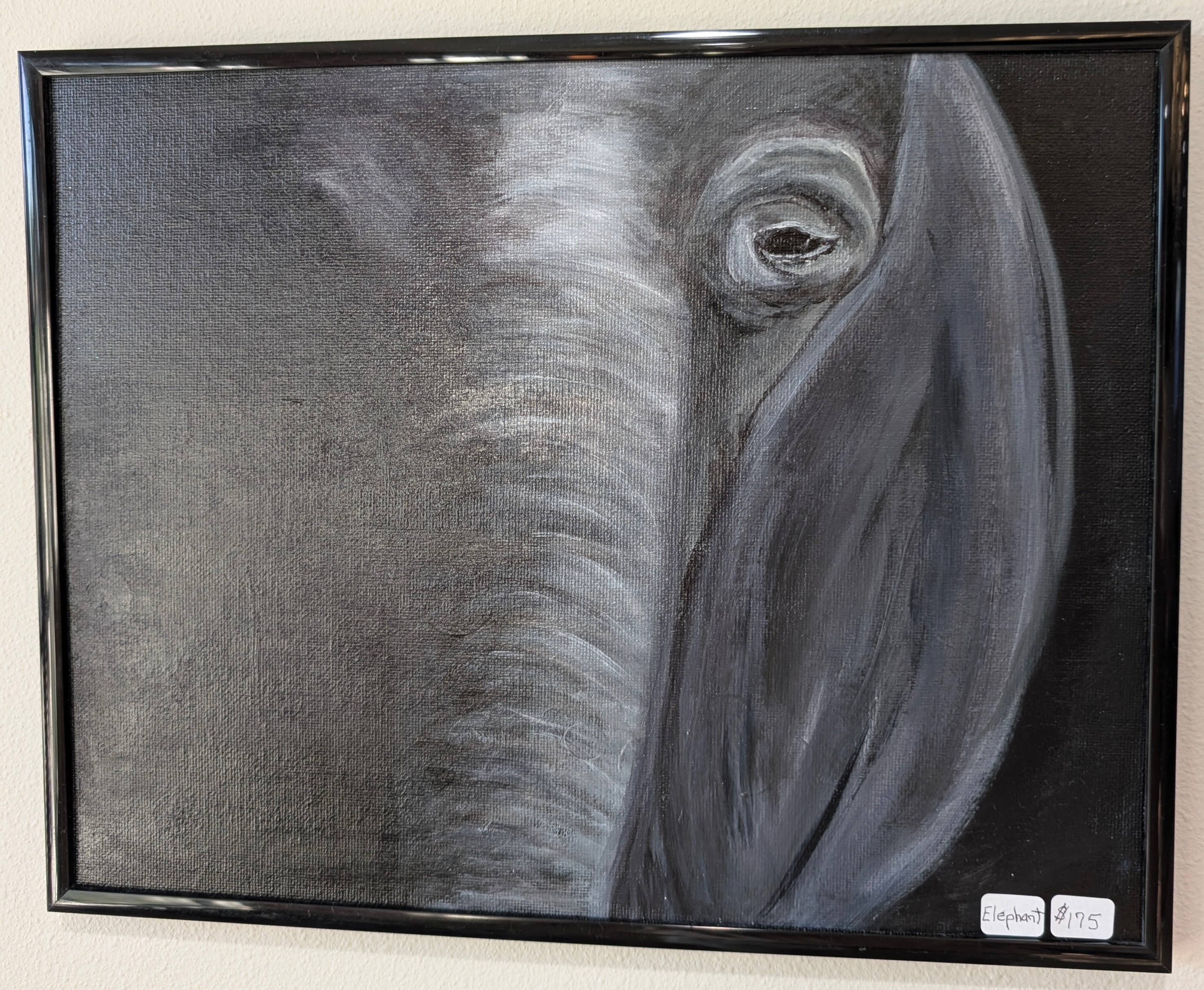 Close acrylic portrait of an elephant eye and trunk in grayscale